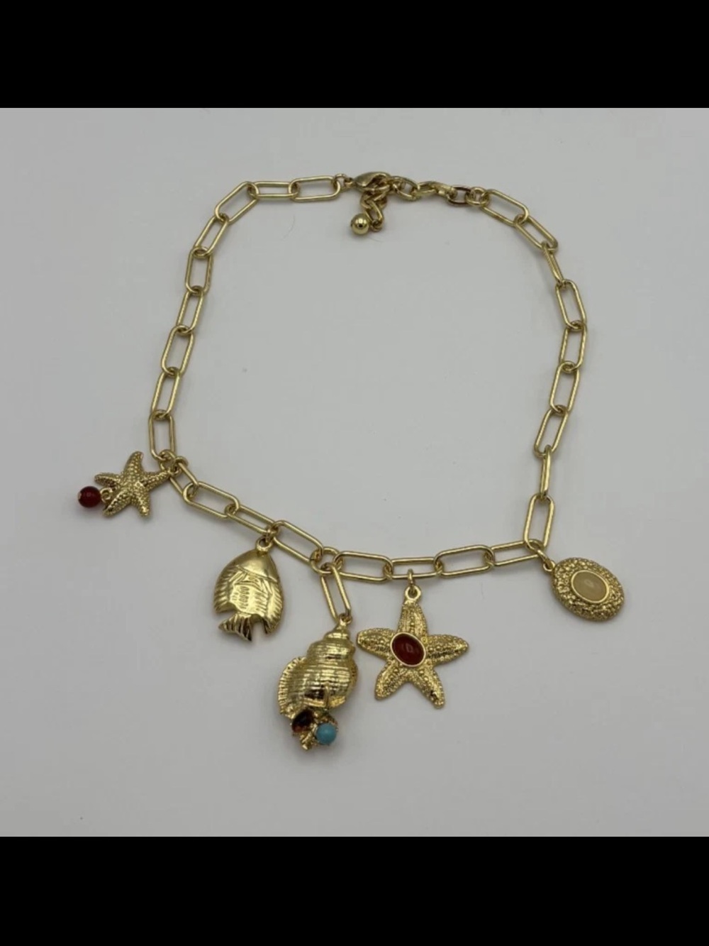 Ben Amun 24K gold plated Seashell Charm Necklace with Red Accents